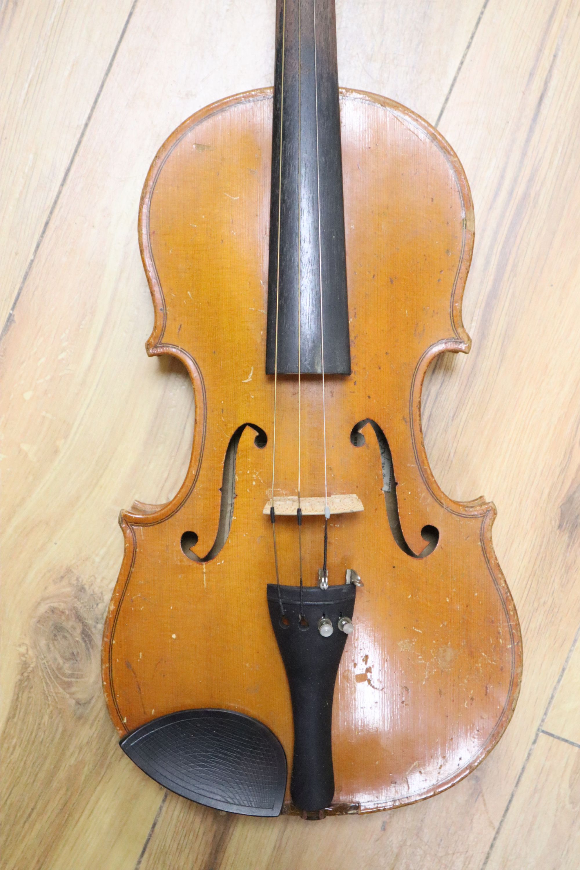 A 3/4 size violin, labelled Stradavarius, cased